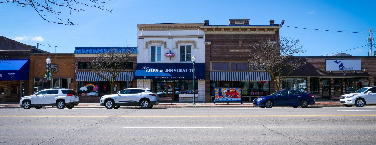 Downtown Clare boasts both flagship storefronts such as Cops & Doughnuts, as well as newcomers like Calla Lily Mercantile, whose retail shop opened less than three years ago.
