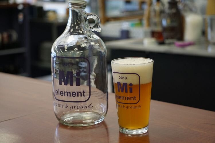 The Mi Element Grains and Grounds name is inspired by Tony’s chemistry background and the dog you’ll find in their logo is their beloved Standard Poodle named Courage.