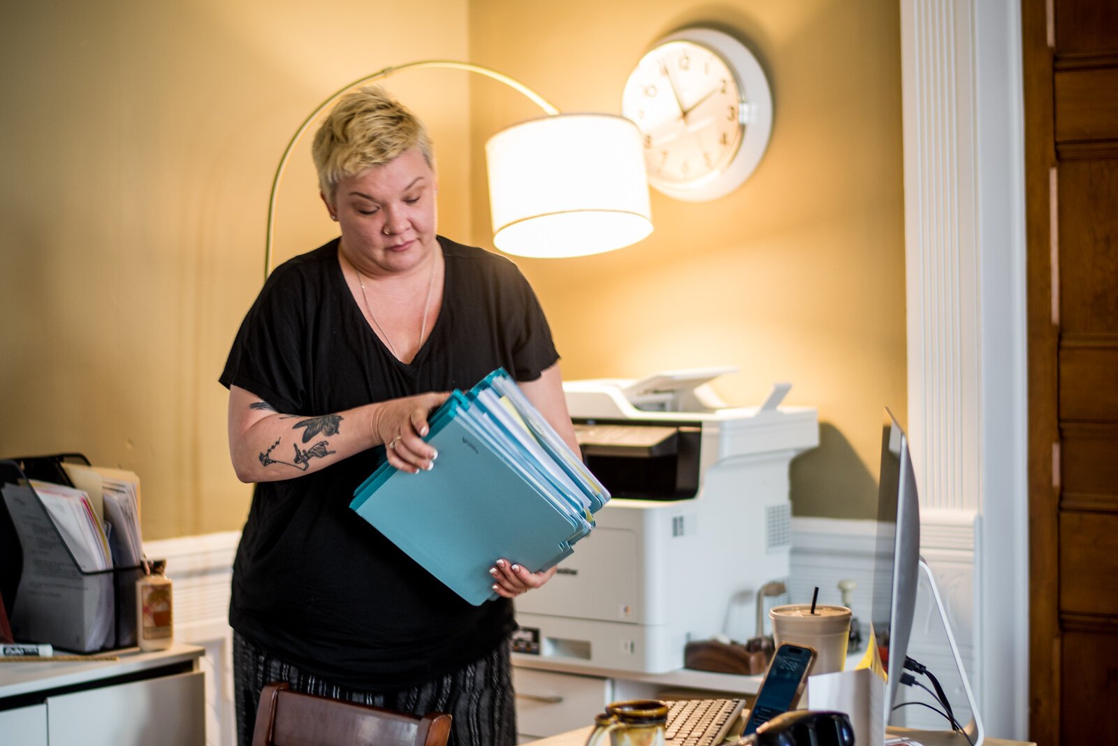 Sarah Cain, executive director, pulls out her active files, thick folders -- 12 cases who are housed, eight who are trying to find housing. She has four new people she'll be meeting soon.