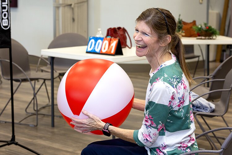 Keri plays chair volleyball at the St. Clair County Council of Aging in downtown Port Huron. 