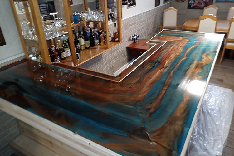 Epoxy bar countertop by Dirty Little Pours.