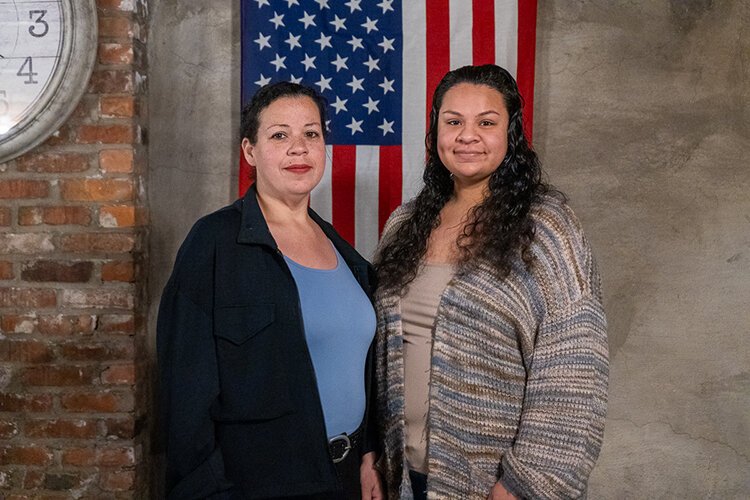Iris Santillano (left) and Irma Lopez, mother and daughter and members of the Hispanic Alliance of Southeast Michigan.