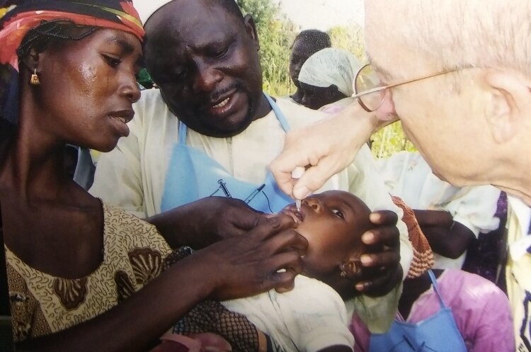 Chuck Cusick has traveled the world in an effort to vaccinate people and eradicate polio. (Photo courtesy of Chuck and Nancy Cusick)