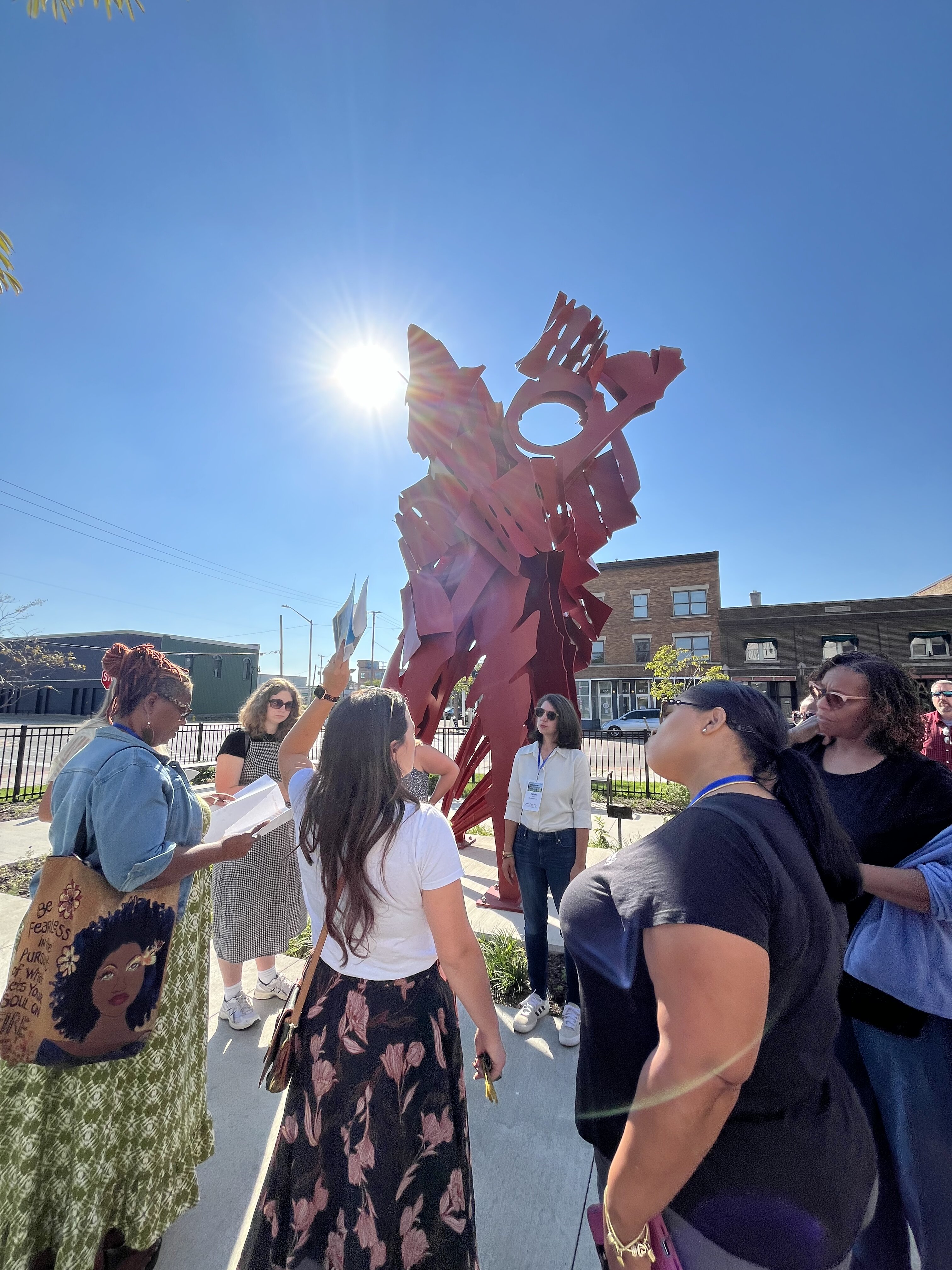 Dakota Riehl, ICCF, shown, giving a tour of Grand Rapids community development projects.