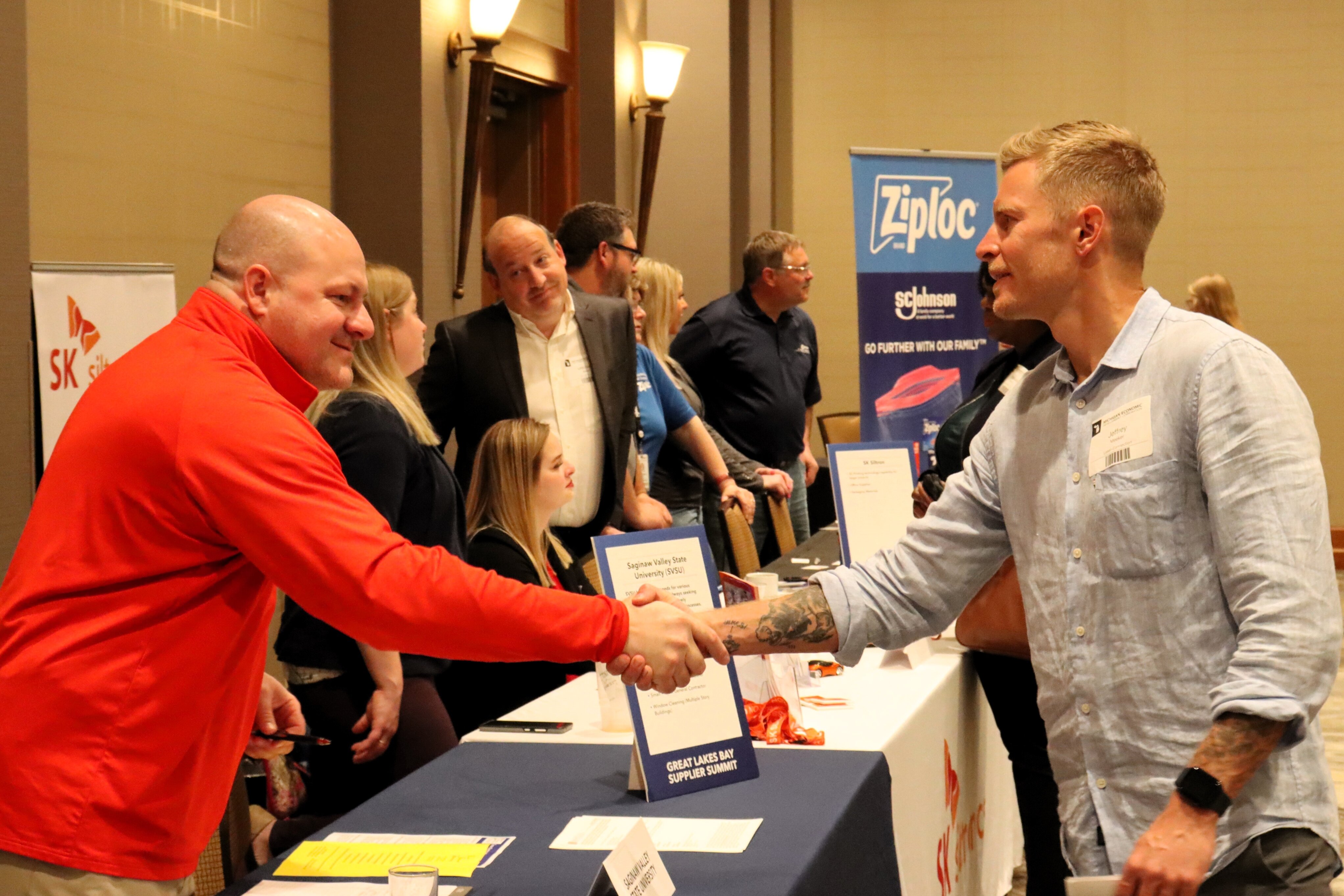 Before and after the speakers, business representatives had a chance to mingle and talk about partnerships.