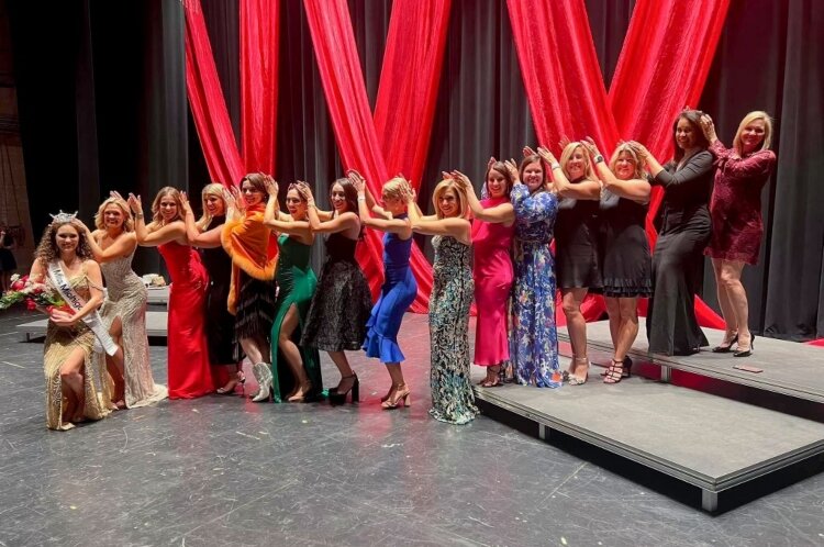 Former Miss Michigans pose as they crown Jenae Lodewyk, of Bay County, as Miss Michigan.