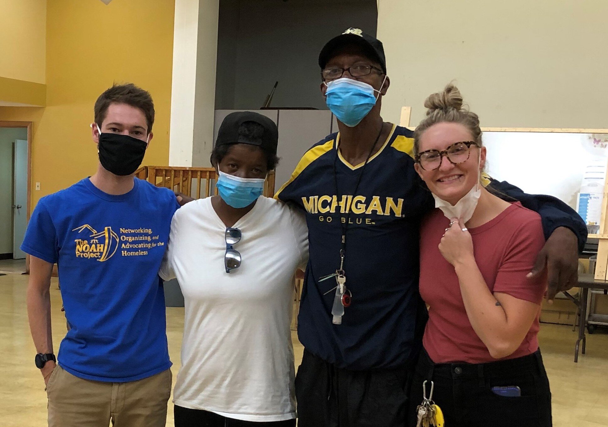 (left to right) Matt Gatti, NOAH Project’s street outreach manager; a family of two whom the outreach team helped house; and the project’s lead street outreach worker, Paige Henson