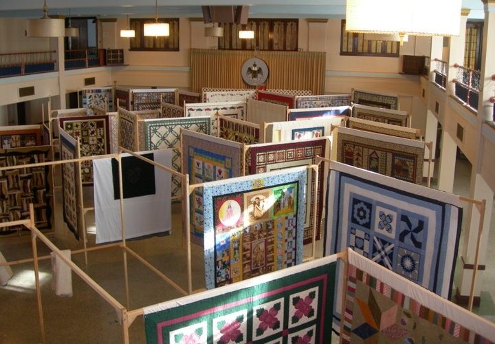 The Bay Heritage Quilters Guild mounts a quilt exhibit. In 2011, it took volunteers two days to set up this exhibit.