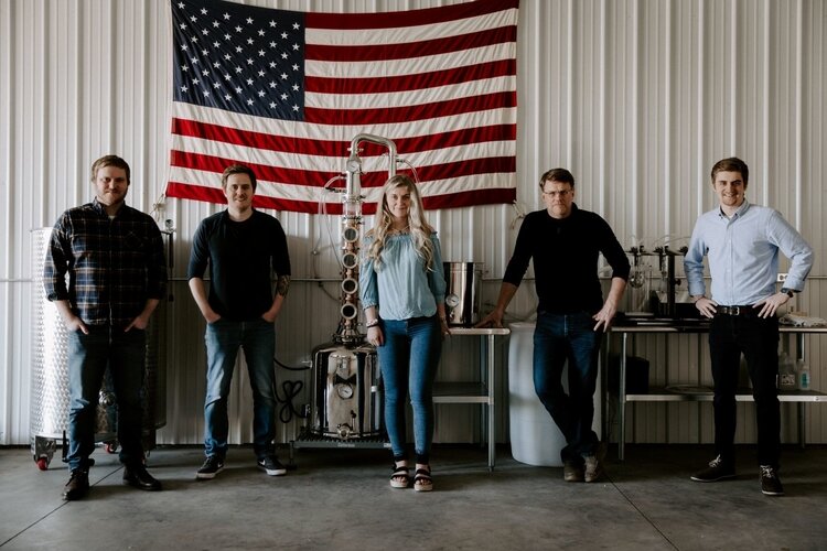 The Lange family – from left, Kenneth (Ken), Kameron, Khloe, David, and Konnor Lange – opened Third Wind Distilling in Bay City. Ken, Kameron, Khloe, and Konnor are siblings. David is their father.