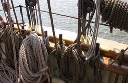 The 2019 Tall Ship Celebration yarn is based on this photo from the inside of a ship. She says the 2019 yarn will feature shades of black, blue, brown, and cream.