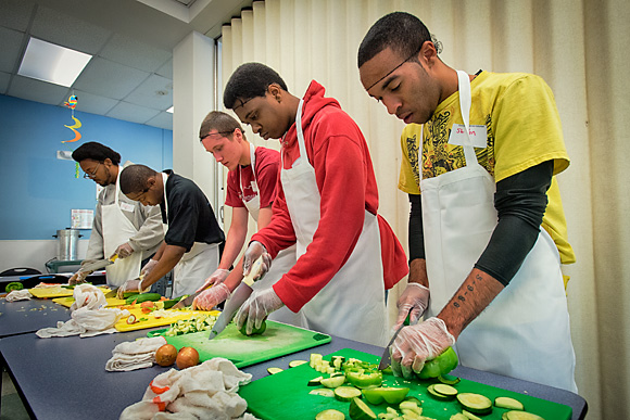 Learning prep skills at the Community Kitchen