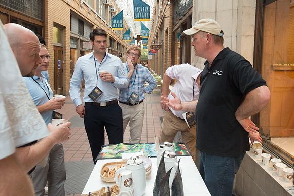 Marcus Goller of Espresso Royale handing out samples of their Haitian coffee