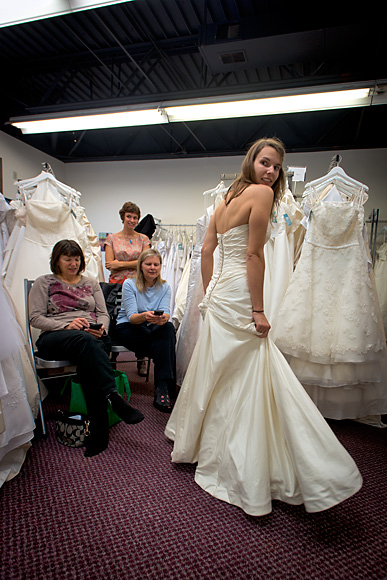 Kirsten Oltersdorf trying on a dress with her mother Sandy and future mother in law Carole Brady