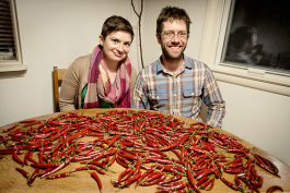 Meredith Kahn and Eric Kampe with a few of their peppers