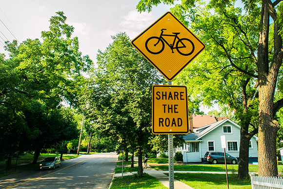 Sign indicates lack of a bike lane