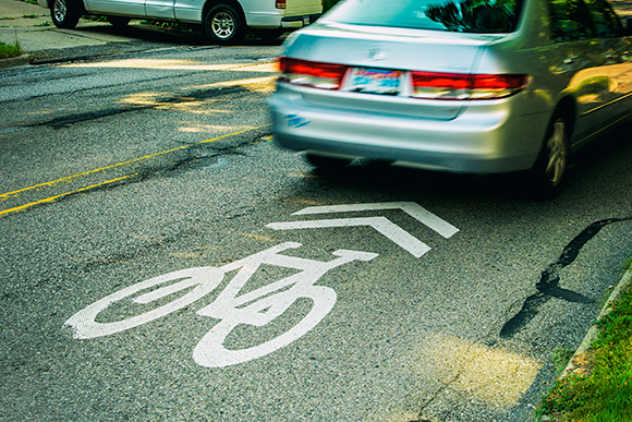 Sign indicates lack of a bike lane