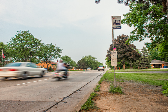 Who needs a sidewalk to a bus stop?