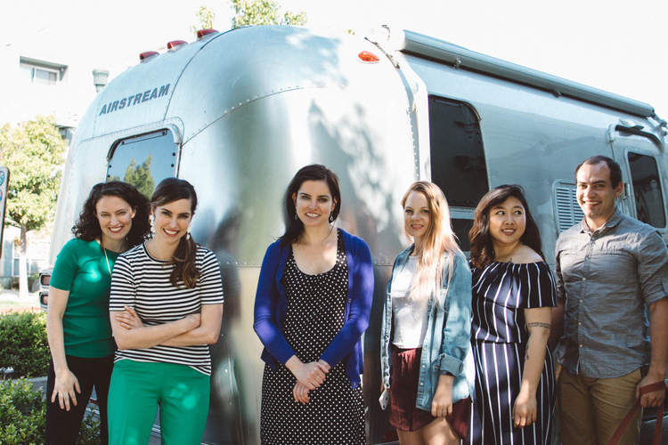 Workit Health team members with their Airstream trailer.