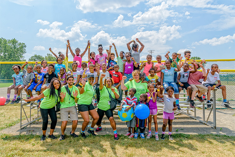 Kids and staff at the Summer Playground Program kickball challenge