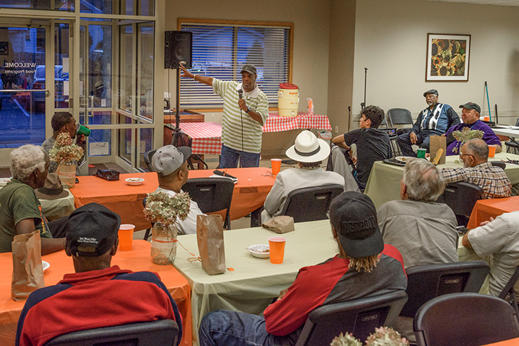 Williams SImmons speaking to a men's group meeting at Hope Clinic