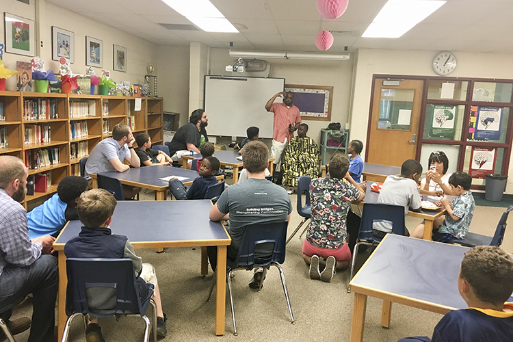 Success coach Ryan Griffin gives a presentation at a Village Project event.