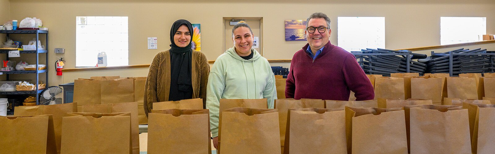 Fatima Noor, Heather McKane, and Douglas Campbell at Hope Clinic.