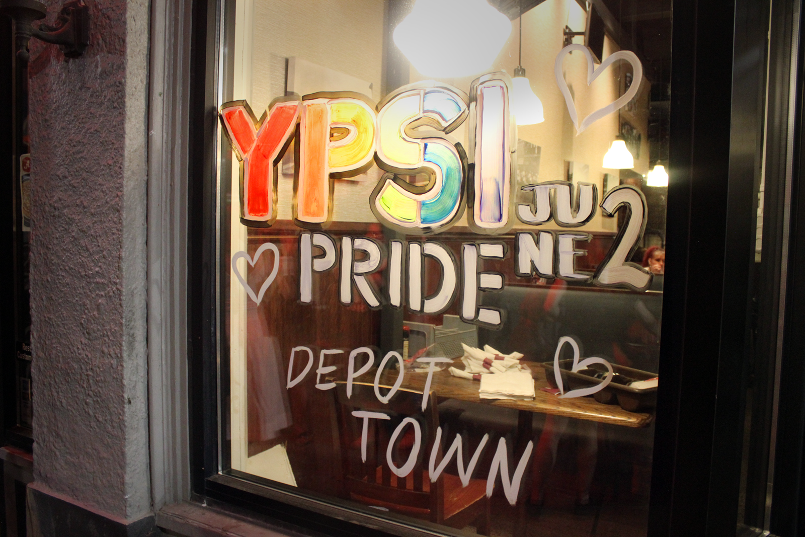 Cross Street businesses get into the Pride spirit, decorating storefronts with rainbow flags and other displays. All windows at Aubree’s Pizza were painted with Pride flags in celebration.