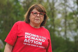 Moms Demand Action Against Gun Violence Washtenaw County lead Rochelle Igrisan at Huron Heights Apartments.