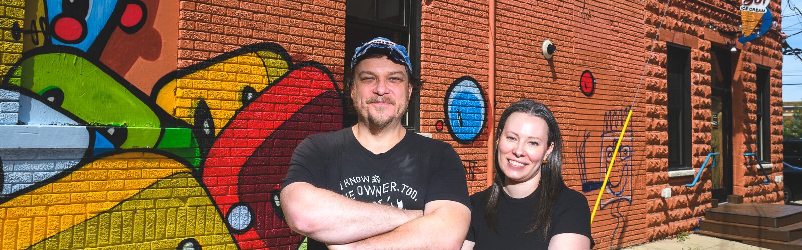 Cold Comfort Ice Cream onwers Eric Farrell and Danielle Berridge by the future store window.