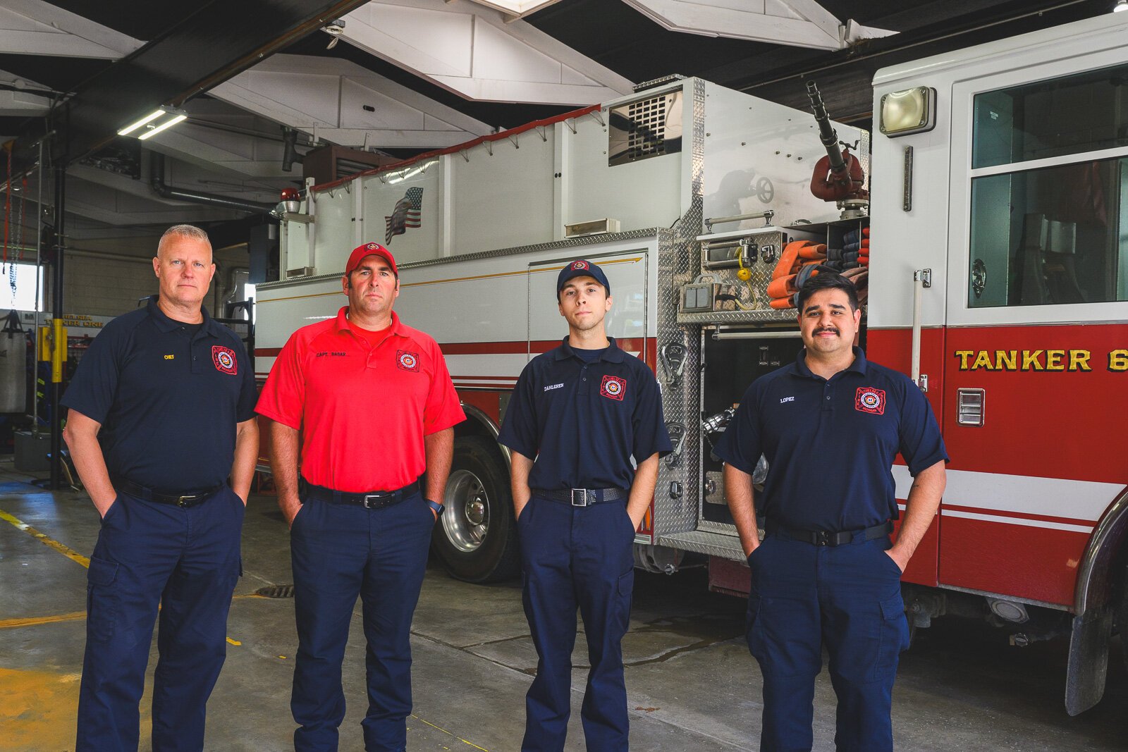 Chief Robert Arbini (left) with staff at the Chelsea fire station.