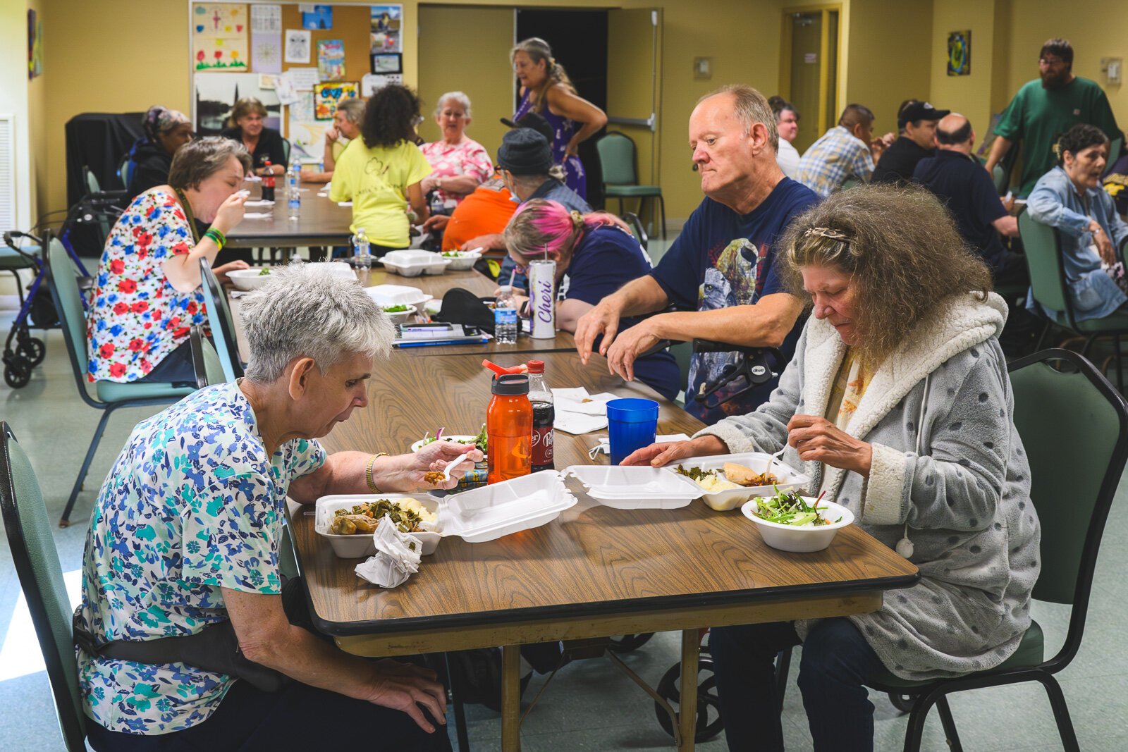 Residents enjoying a meal from Kayla's Kitchen at Chidester Place.