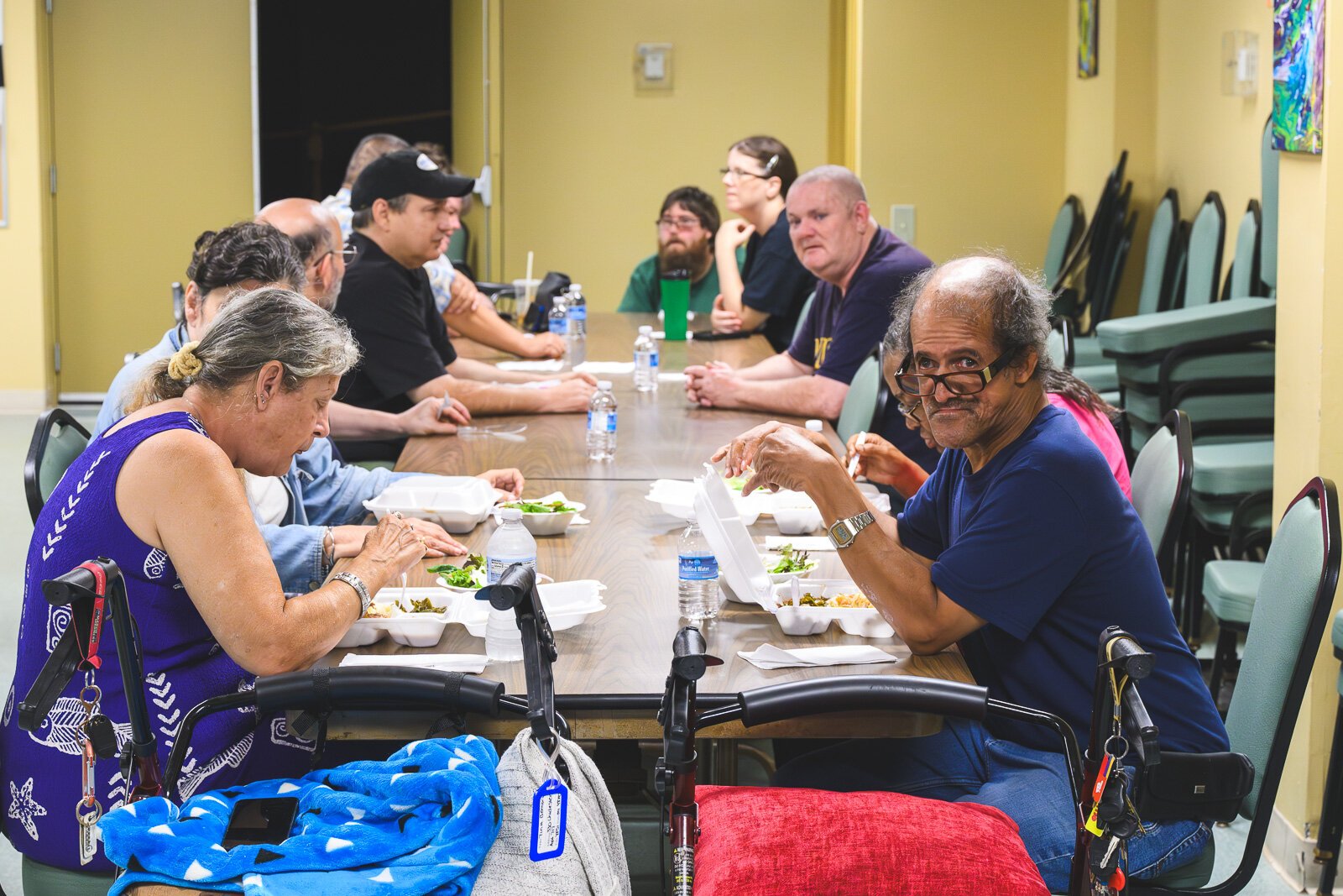 Residents enjoying a meal from Kayla's Kitchen at Chidester Place.