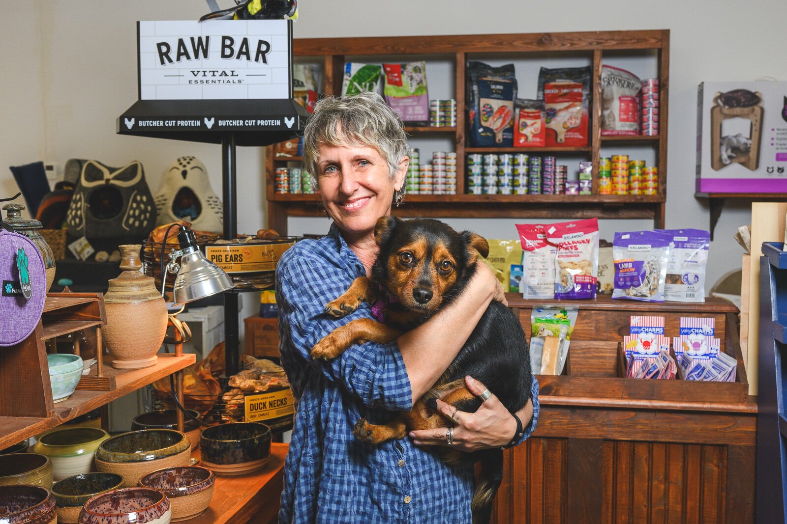 Depot Town Cats and Dogs owner Holli Andrews with Levi.