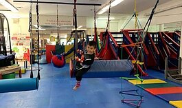 A child plays at We Rock the Spectrum-Ann Arbor.