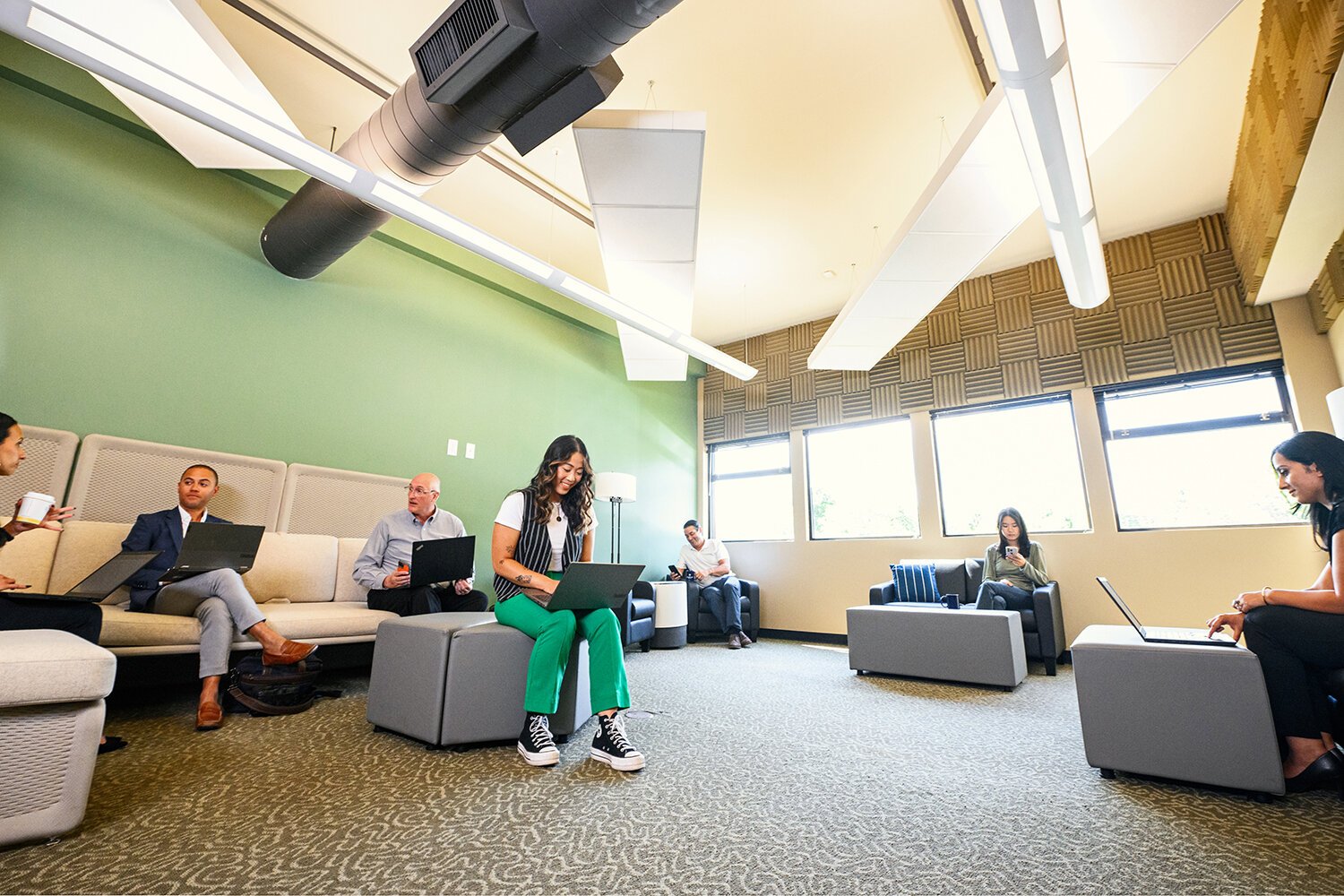 People coworking at BrightWorks' Forest Cove location.