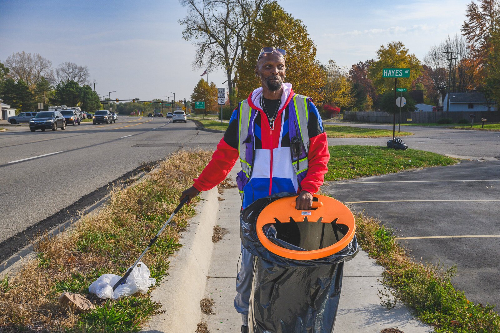 Willie Percy with the SHINE team cleaning on Ecorse Road.