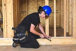 Ann Arbor Student Building Industry Program students working on a house on Sedgewood Lane in Ann Arbor..