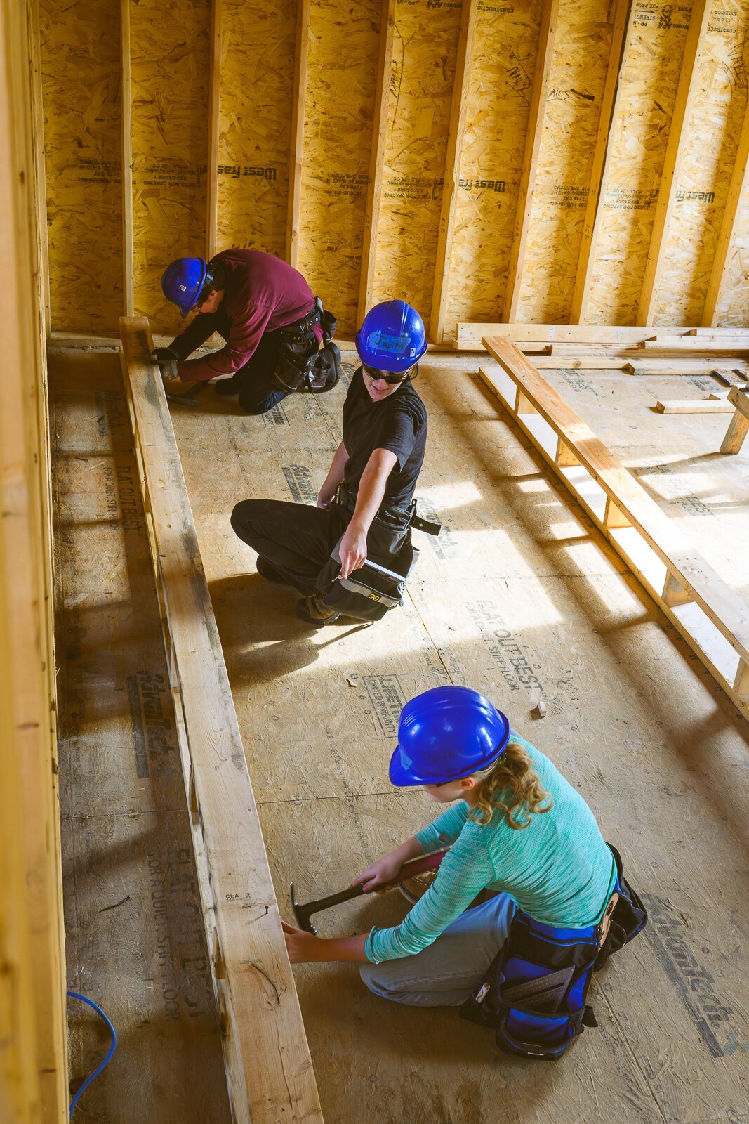 Ann Arbor Student Building Industry Program students working on a house on Sedgewood Lane in Ann Arbor..