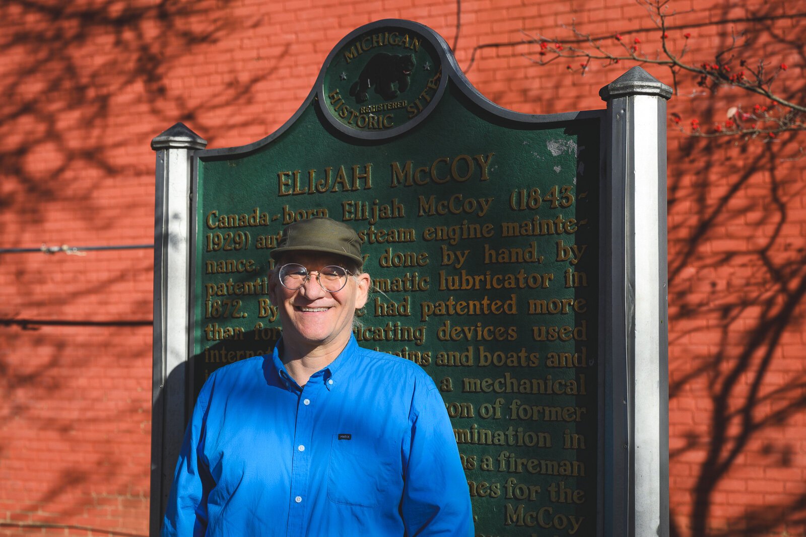 Dave Strenski in front of the Elijah McCoy plaque in Library Park.