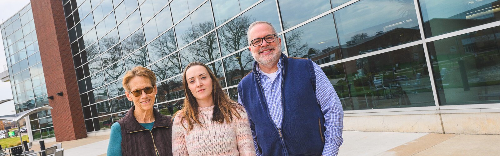 Kate Mehuron, Emma Wuetrich, and Dennis O'Grady at EMU's Student Center.