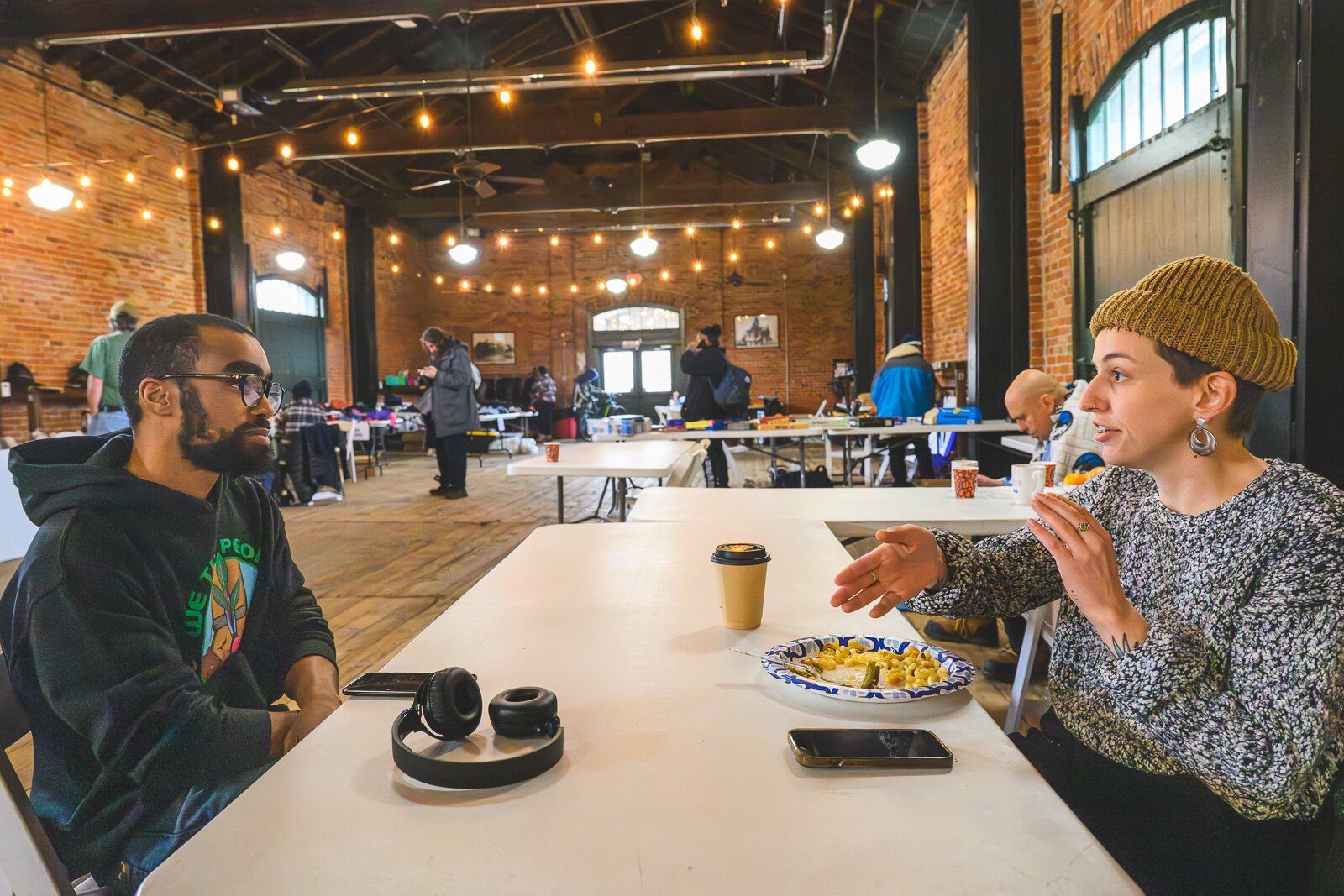 Community advocates Shihab Jackson and Kat Layton at the Ypsilanti Freighthouse daytime warming center.