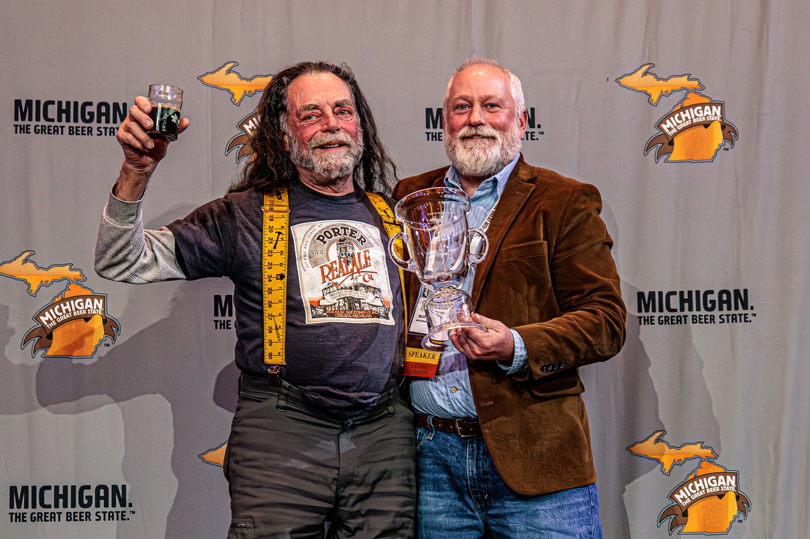 Ted Badgerow (left) receives the Tom Burns Award for brewing trailblazers.