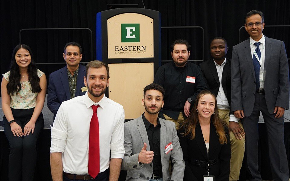 Dr. Sanjib Chowdhury (far right), faculty director for the Eastern Michigan University Center for Entrepreneurship, and students from a past business plan competition.