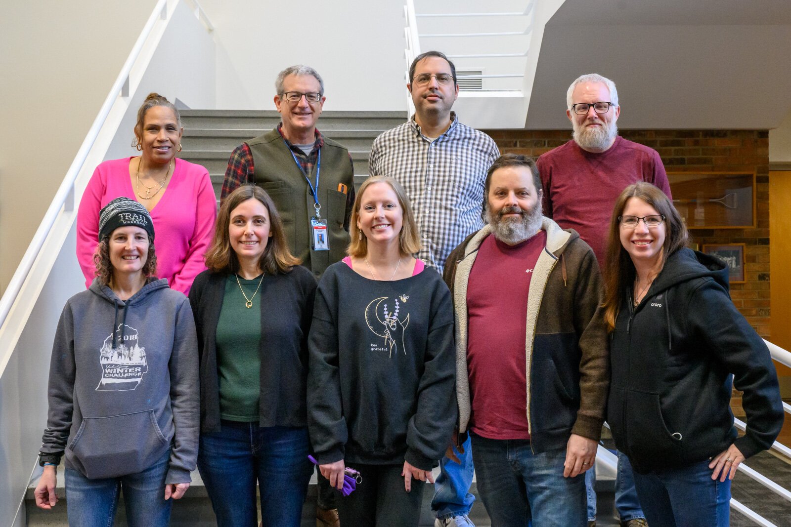 Washtenaw County CMH staff. Top row L-R: Valerie Bass, Dr. Montgomery Brower, Andrew Grier, Shad Jordan. Bottom row l-R: Shannon Ellis, Margaret Carmalt, Angela Burchard, Jeff Beckley, Melisa Tasker