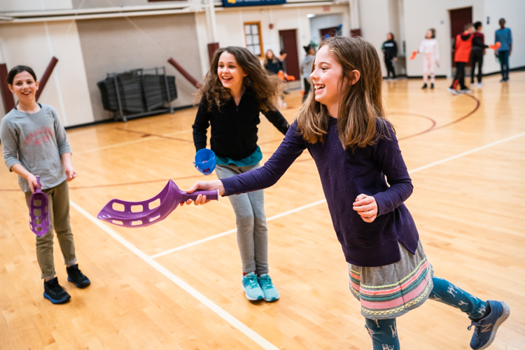 Renaissance Academy students participate in a game in the school's gymnasium