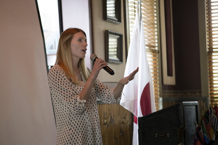 President of the Mt. Pleasant Rotary Club, Alysha Fisher, gives closing announcements at the club's meeting on Monday, Oct.8, 2018.