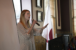 President of the Mt. Pleasant Rotary Club, Alysha Fisher, gives closing announcements at the club's meeting on Monday, Oct.8, 2018.