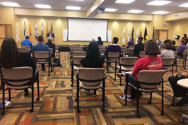 Attendees gather in the community room on the Mt. Pleasant campus of MidMichigan College.