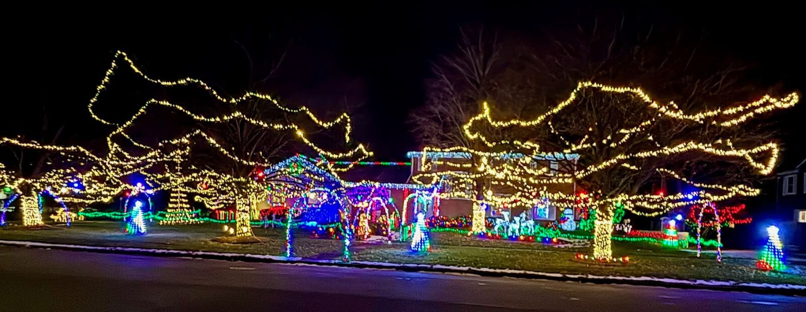 At 1054 E. Maple Street, the Gurski family decorates their home near McLaren Central Michigan Hospital.