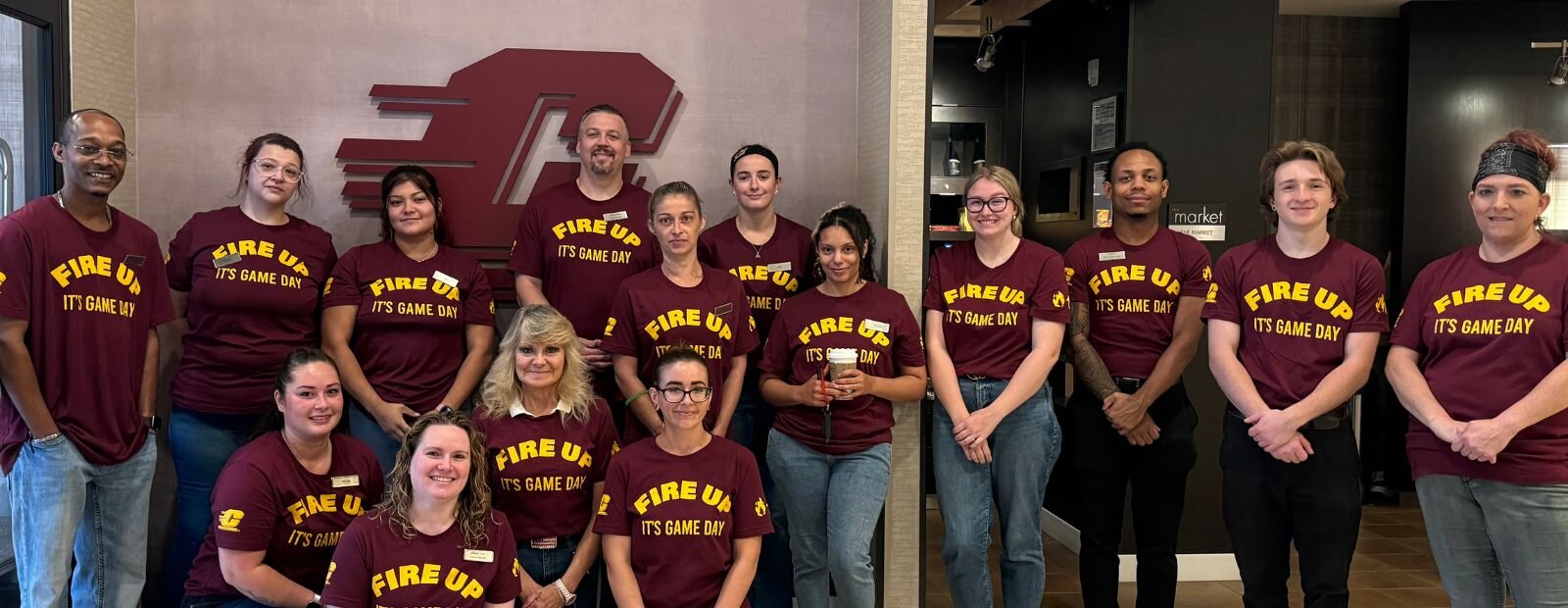 The Courtyard staff wear Game Day t-shirts at the first home CMU football game of the season on Aug. 29, 2024.